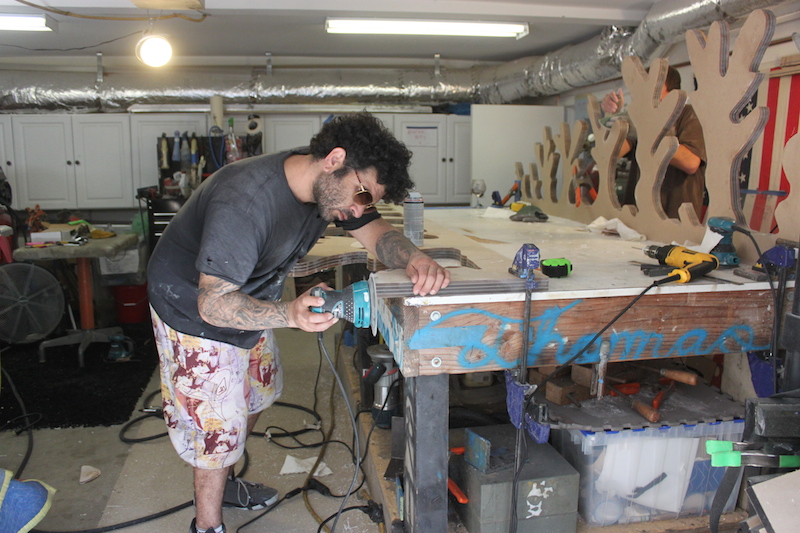 Aaron R. Thomas creating the Bionic Christmas Tree