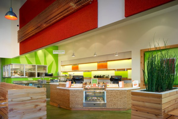 Custom architectural elements for Veggie Grill restaurants matching pantone colors of logo