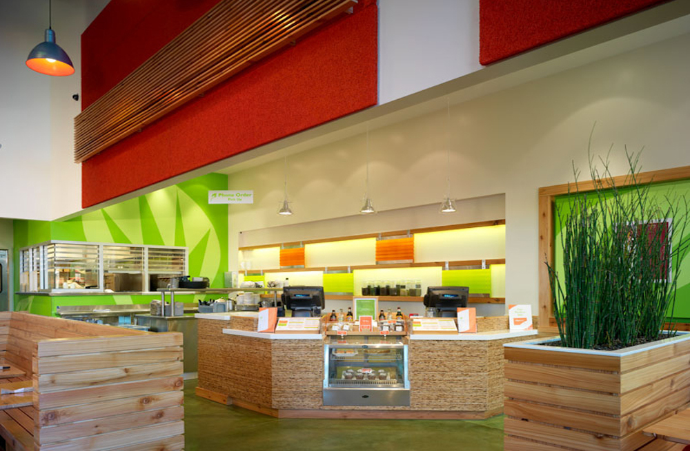 Custom architectural elements for Veggie Grill restaurants matching pantone colors of logo
