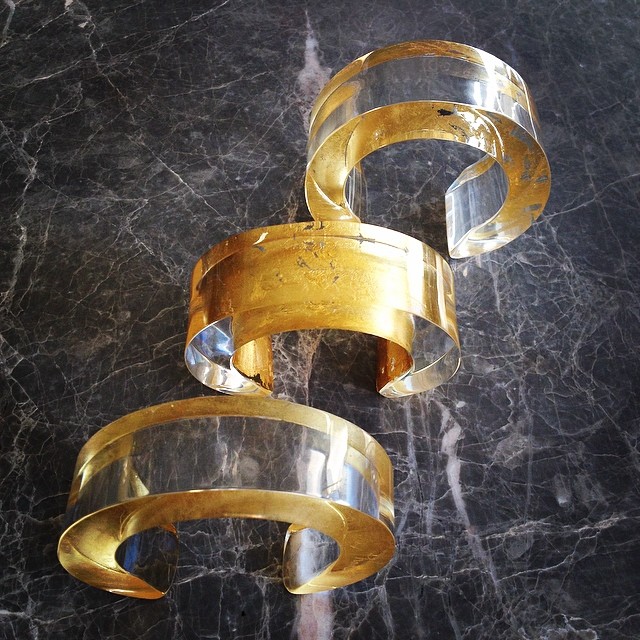 On The Money gold and acrylic cuffs by Stefanie Phan